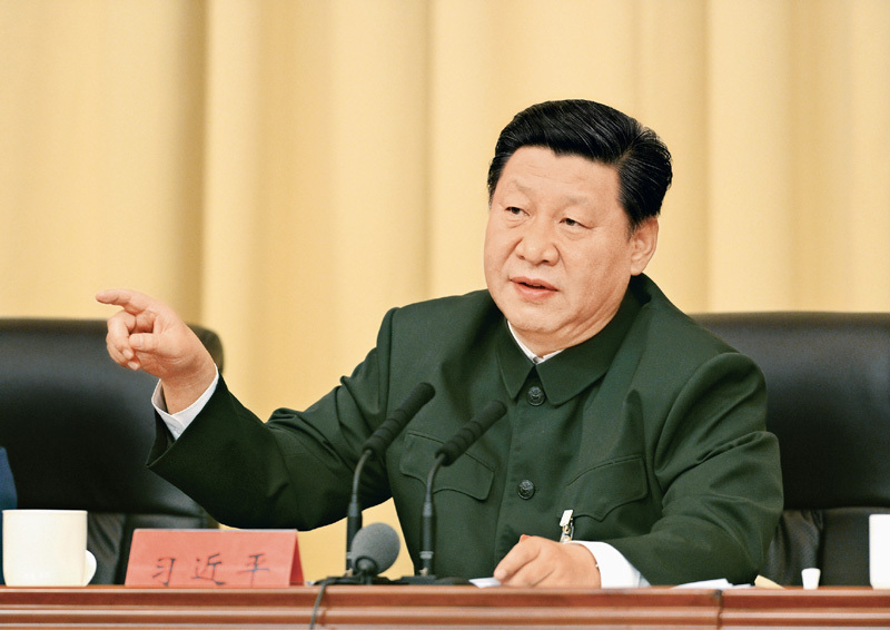 2014年10月30日，全军政治工作会议在福建省上杭县古田镇召开。这是10月31日，中共中央总书记、国家主席、中央军委主席习近平出席会议并发表重要讲话。 新华社记者 李刚/摄